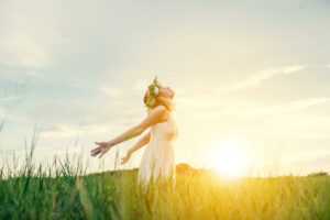 calm-teenager-with-sun-background